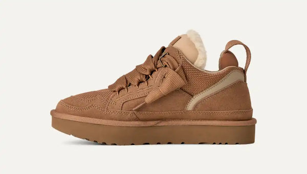 Tan sneaker with sherpa lining on a white background