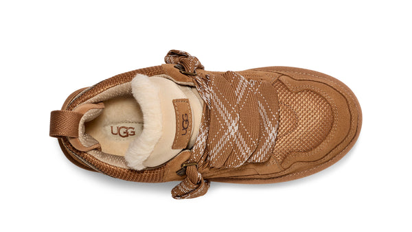Tan sneaker with sherpa lining on a white background