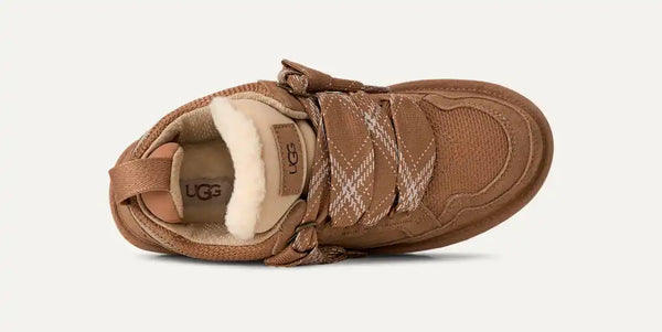 Tan sneaker with sherpa lining on a white background