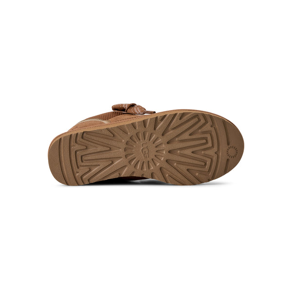 Tan sneaker with sherpa lining on a white background