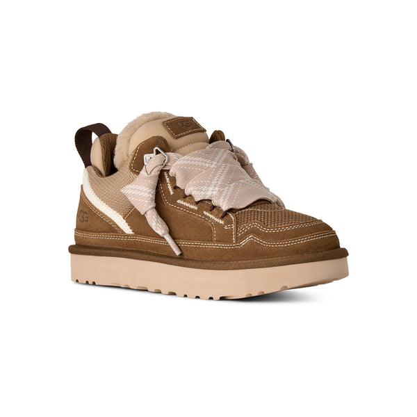 Tan and brown sneaker on a white background