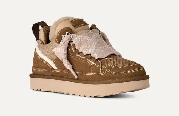 Tan and brown sneaker on a white background