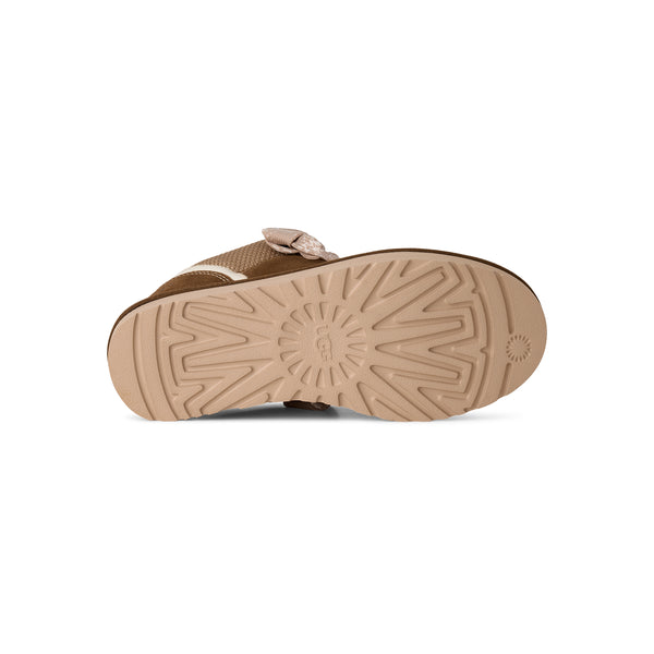 Tan and brown sneaker on a white background