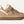 Light tan sneakers on a white background