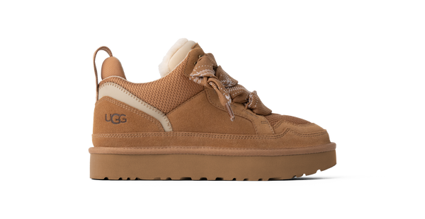 Kids tan sneaker on a white background