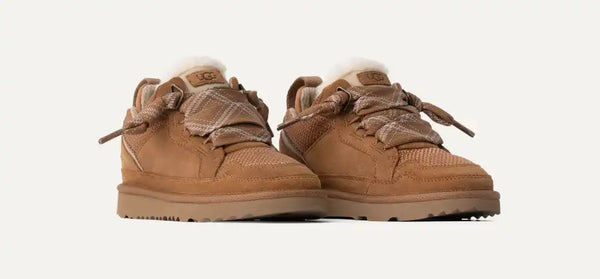 Kids tan sneaker on a white background