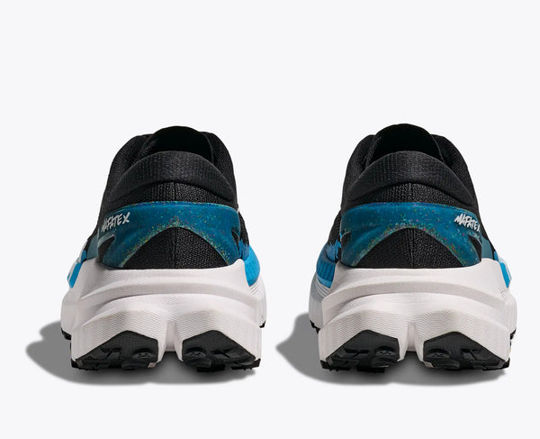 Black and blue running shoes with 'Mizuki' branding on a white background