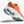 Orange and white running shoe with blue outsole on a white background