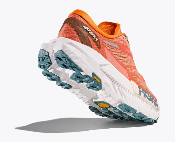 Orange and white running shoe with blue outsole on a white background