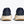 Navy running shoes with beige soles on a white background