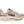 Beige running shoe with 'Hoka' branding on a white background