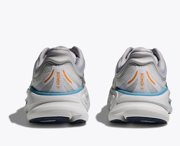 White running shoes with blue soles and orange accents on a white background