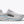 White running shoe with Hoka branding on a white background