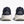 Navy running shoes with white soles on a light gray background