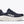 Navy running shoe with white sole on a white background