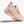 Pink running shoe with 'Hoka' branding on a white background and a durable outsole.