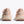 Pair of pink running shoes on a white background
