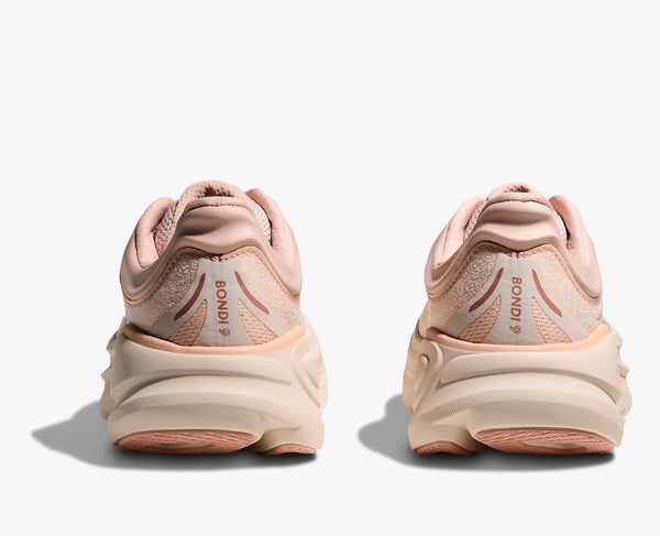 Pair of pink running shoes on a white background