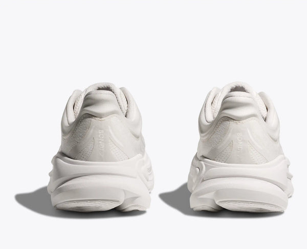 White sneakers shown from the back on a white background