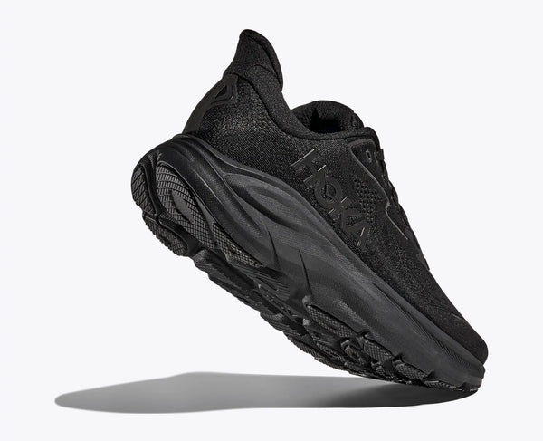 Black athletic shoe on a white background