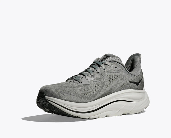 The medial side of a gray Hoka Clifton 10 running shoe on a white background