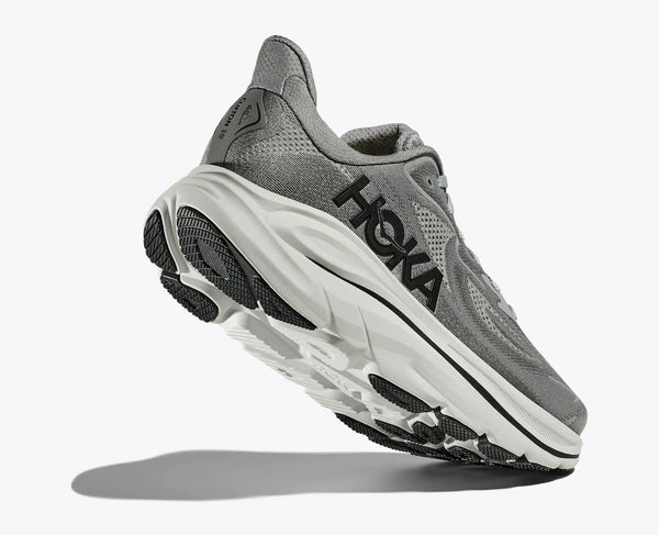 A closeup of a Clifton 10 with a grey upper and white midsole.