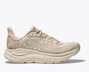 Oatmeal tonal colored Hoka running shoe with Hoka branding on a white background