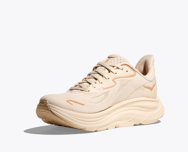 Beige running shoe on a white background