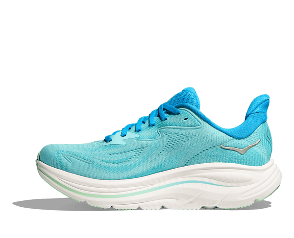 A blue and green line runs through the middle of the white midsole.