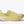 Yellow running shoe with white sole on a light gray background