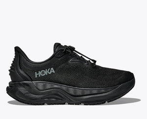 Black slip-resistant walking adn running shoe with silver accents on a white background.