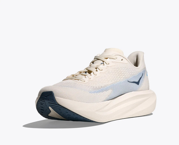 Alabaster running shoe with blue accents on a white background