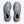 Pair of gray and orange Hoka running shoes on a white background