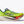 Green running shoe with Hoka branding on a white background