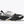 Black and white running shoe with Hoka branding on a white background