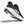 Black running shoe with white sole on a white background