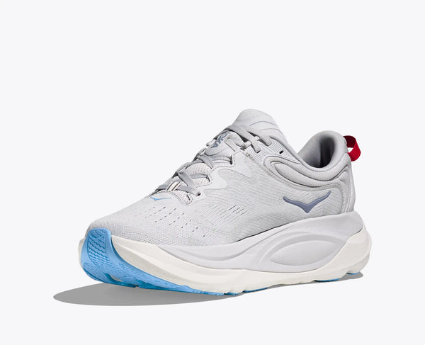 Gray athletic shoe with blue sole on a white background