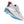 White running shoe with blue sole and red tag on a white background