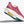 Pink running shoe with white sole on a light gray background