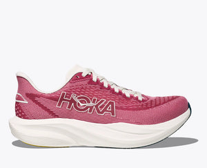 Light pink women's Hoka mach 7 running shoe with white sole on a white background