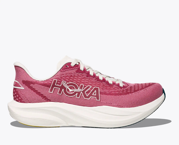 Light pink women's Hoka mach 7 running shoe with white sole on a white background