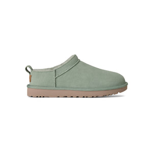 Light green ugg slipper on a white background