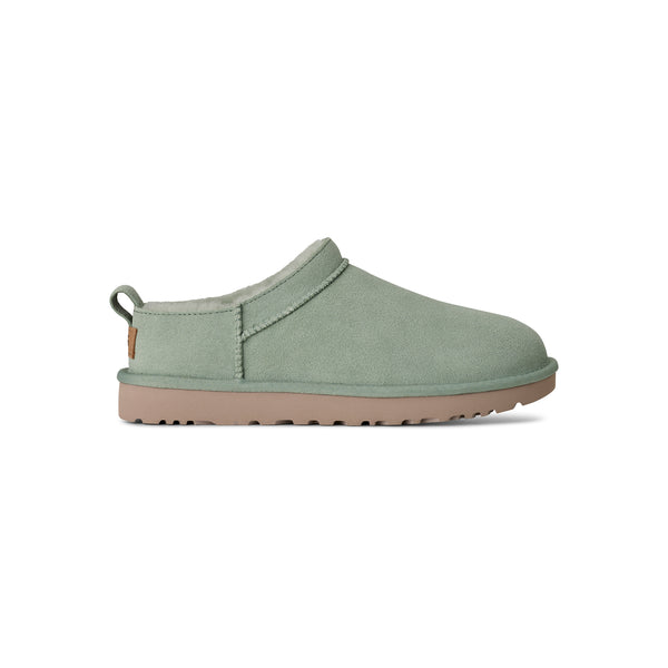 Light green ugg slipper on a white background