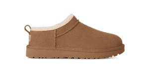 Brown slip-on shoe with white lining on a green background