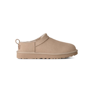 Beige ankle length slipper on a white background