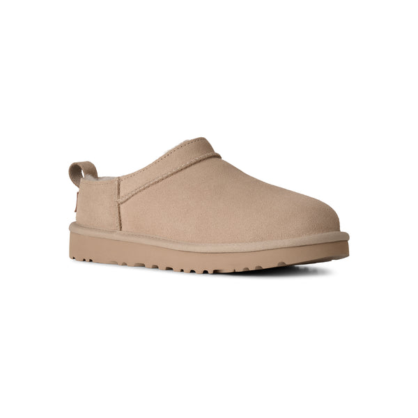 Beige ankle length slipper on a white background