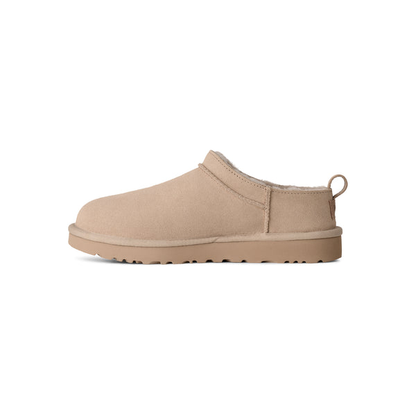 Beige ankle length slipper on a white background