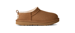 Kids ankle length tan slipper boot on a white background