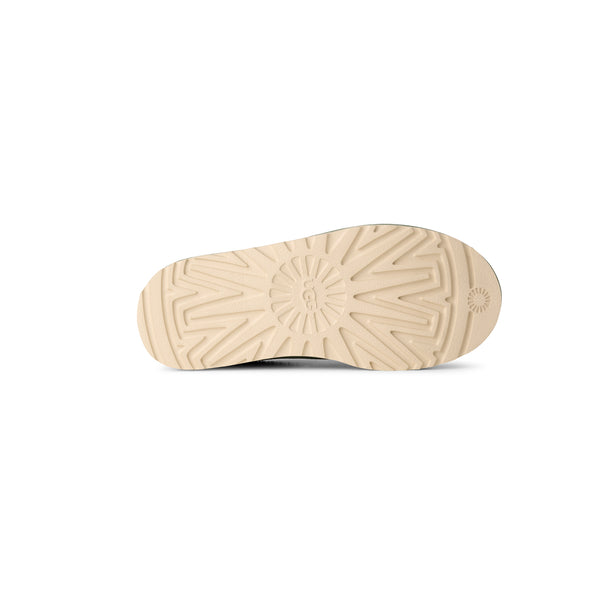 Light green slipper with tan accents