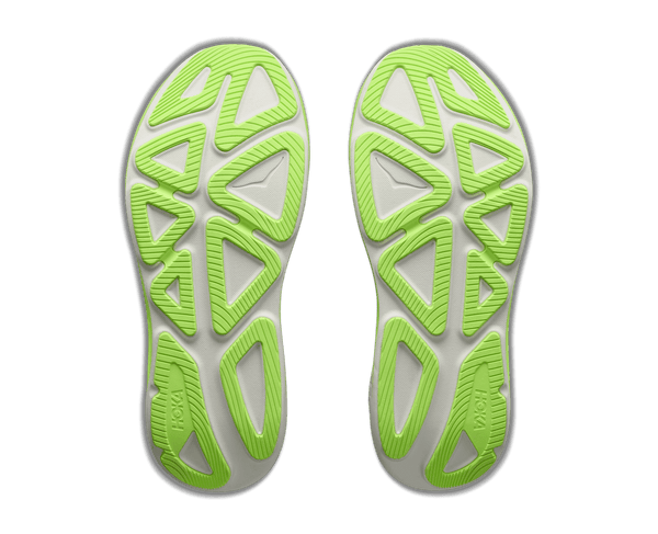 Running shoe with white and green midsole and black upper
